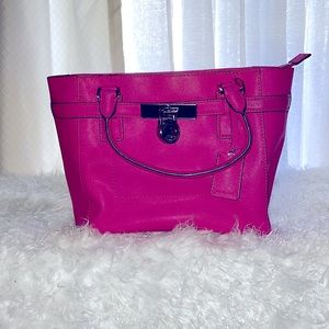 Michael Kors HOT Pink this item is gently used